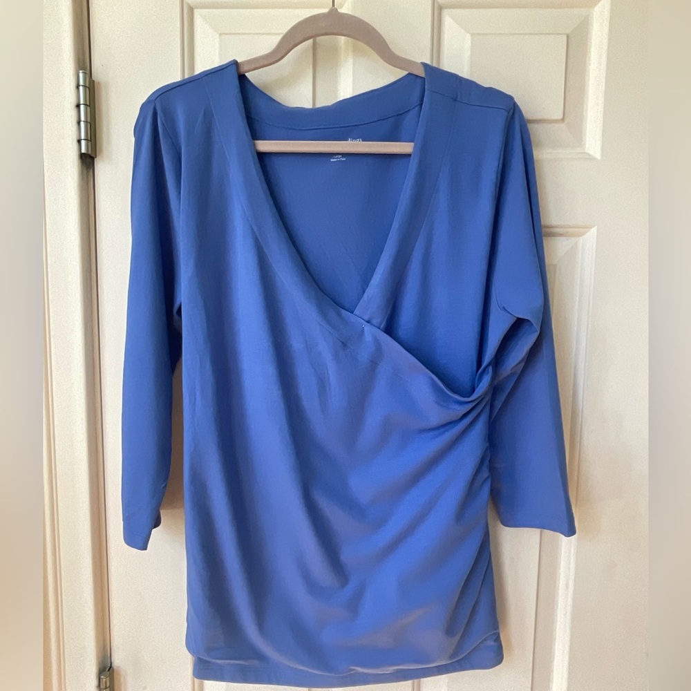 Soft surrounding knit top.